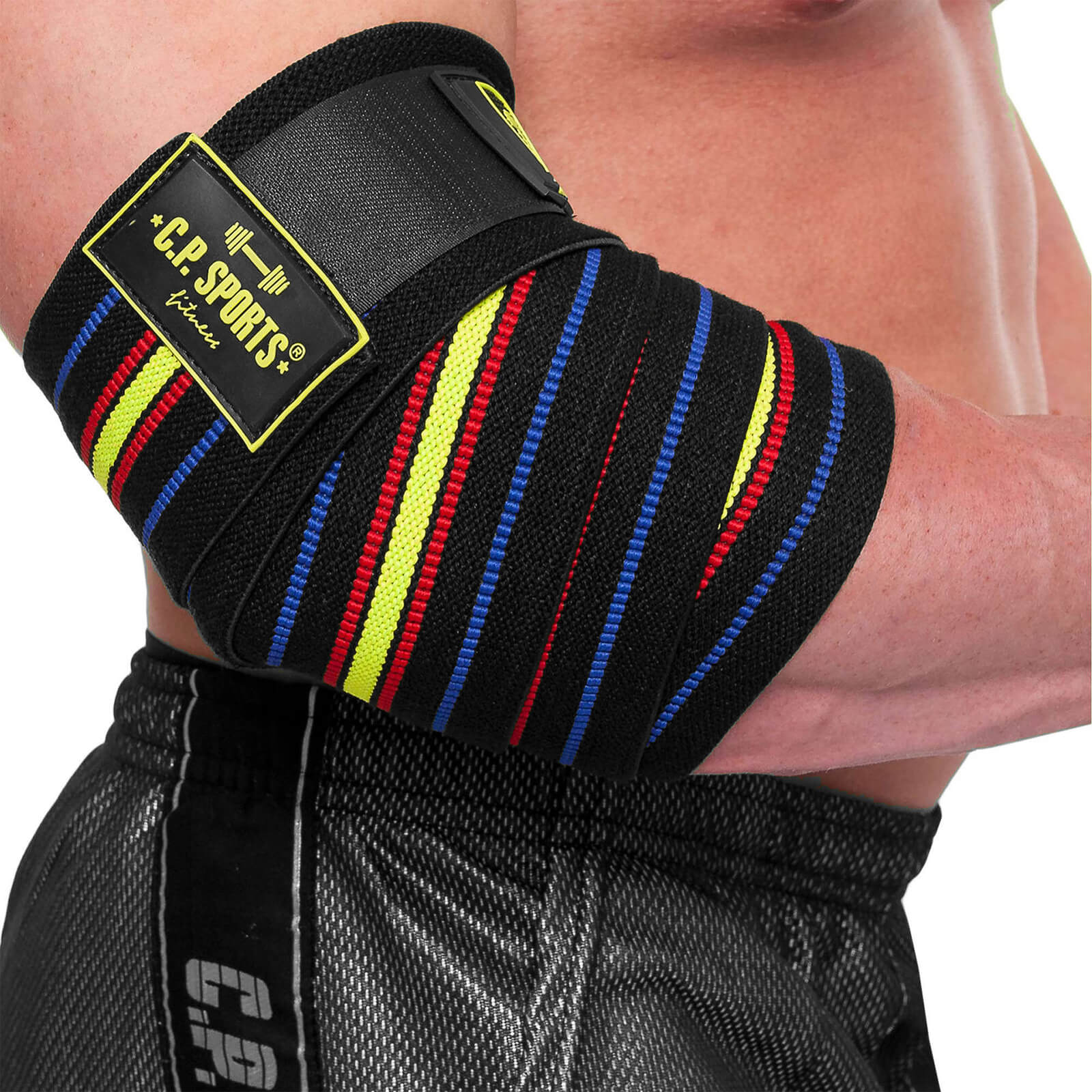 Kolla in Elbow Wraps Pro, black/blue/red/yellow, C.P. Sports hos SportGymButiken